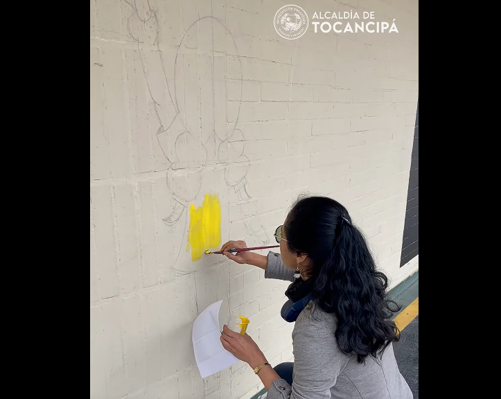 Un mural que refleja los sueños de la |infancia| en la comunidad